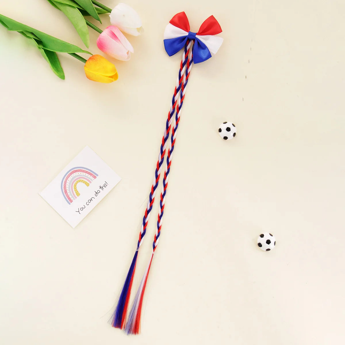 Football fans cheered for the national team players and danced wildly at the sports party, wearing hairpins and headbands.