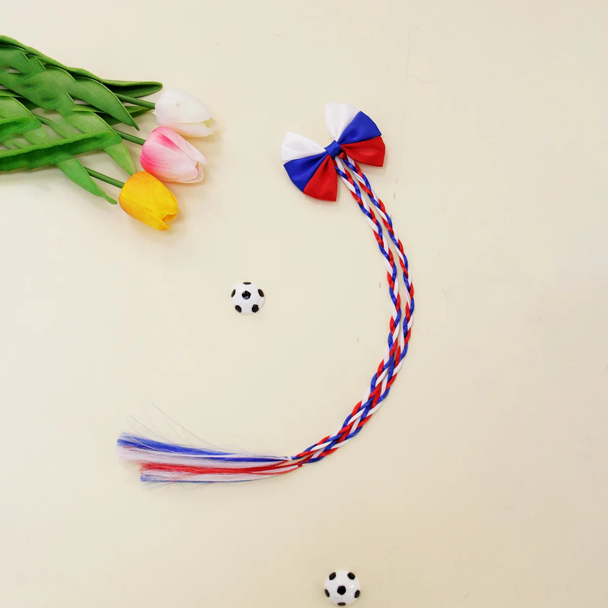 Football fans cheered for the national team players and danced wildly at the sports party, wearing hairpins and headbands.