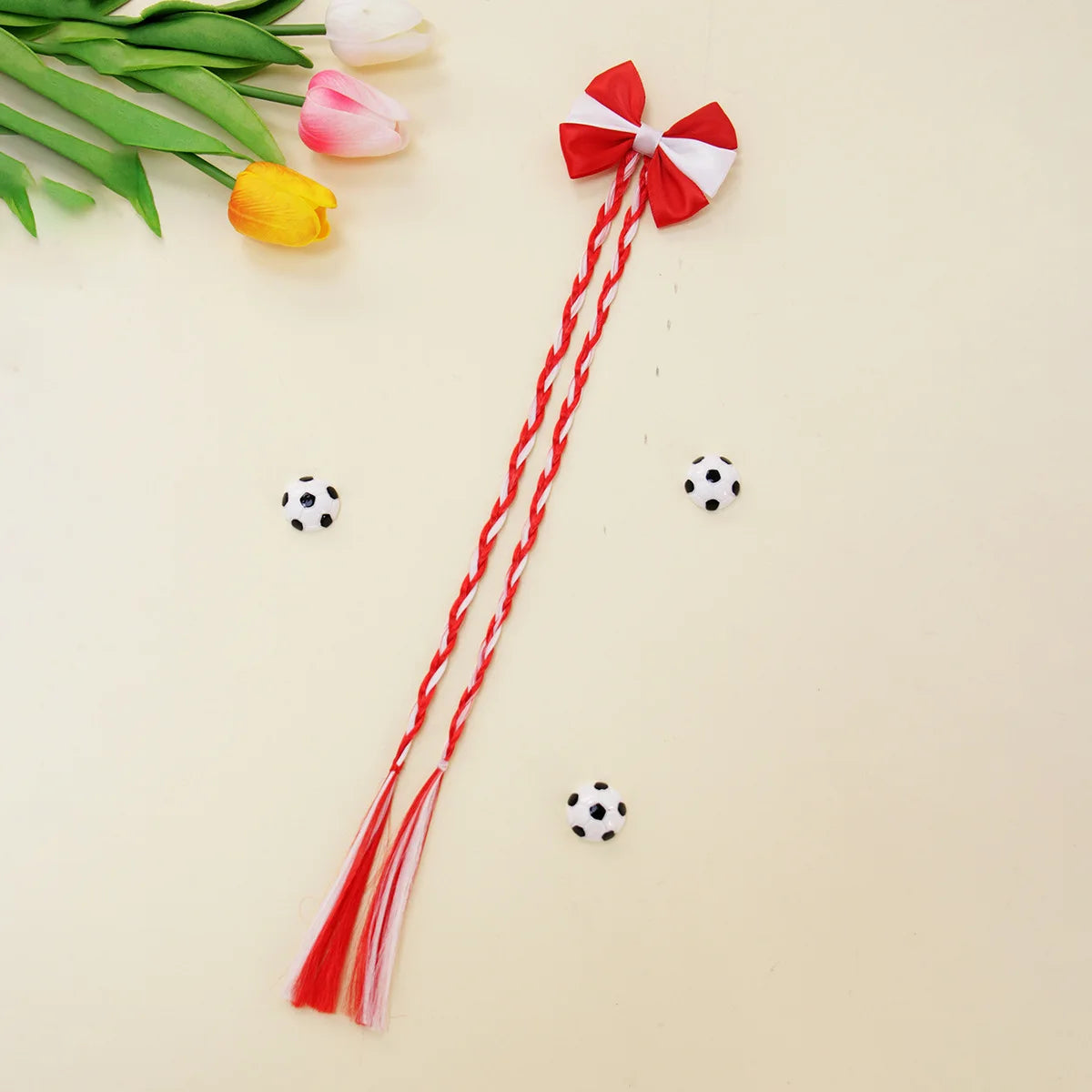 Football fans cheered for the national team players and danced wildly at the sports party, wearing hairpins and headbands.
